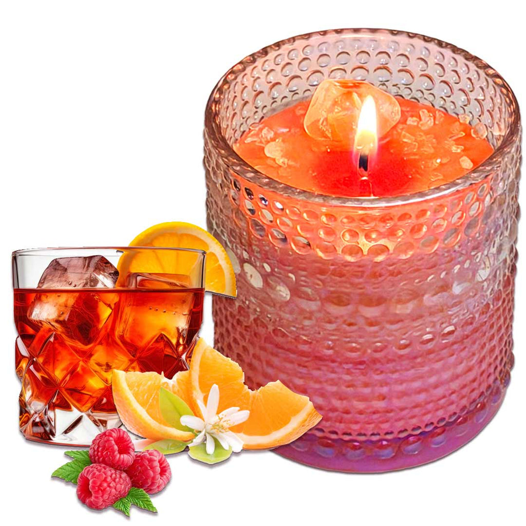 Tangerine & Orange Blossom on Sparkling Negroni & Raspberry Magick Intention Candle. Adorned with Angel Aura. Beautiful iridescent bubble ornate vessel. Bright Orange and Raspberry colored wax. 