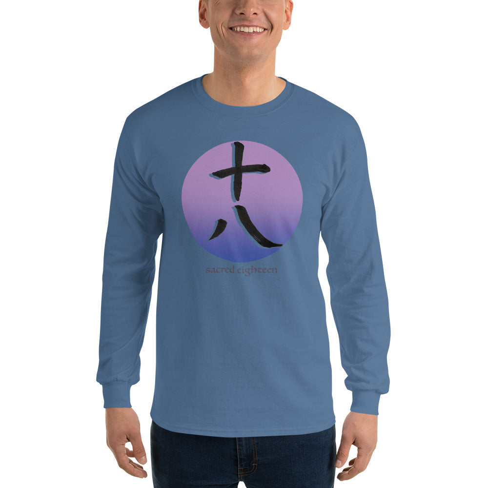 Person wearing a dusty blue  long-sleeve shirt with a purple and black Japanese 18  design.