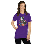 Woman wearing a purple t-shirt with a colorful dia de los meurtos dog design.