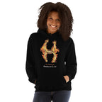 Person wearing a  black hoodie with a fiery golden horseshoe  design, All Fired Up! American Luck.