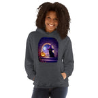 Woman wearing gray hoodie with Wizard Kitten by the stone wall arched window with the full moon and a jack-o-lantern. 