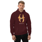 Person wearing a  maroon hoodie with a fiery golden horseshoe  design, All Fired Up! American Luck.