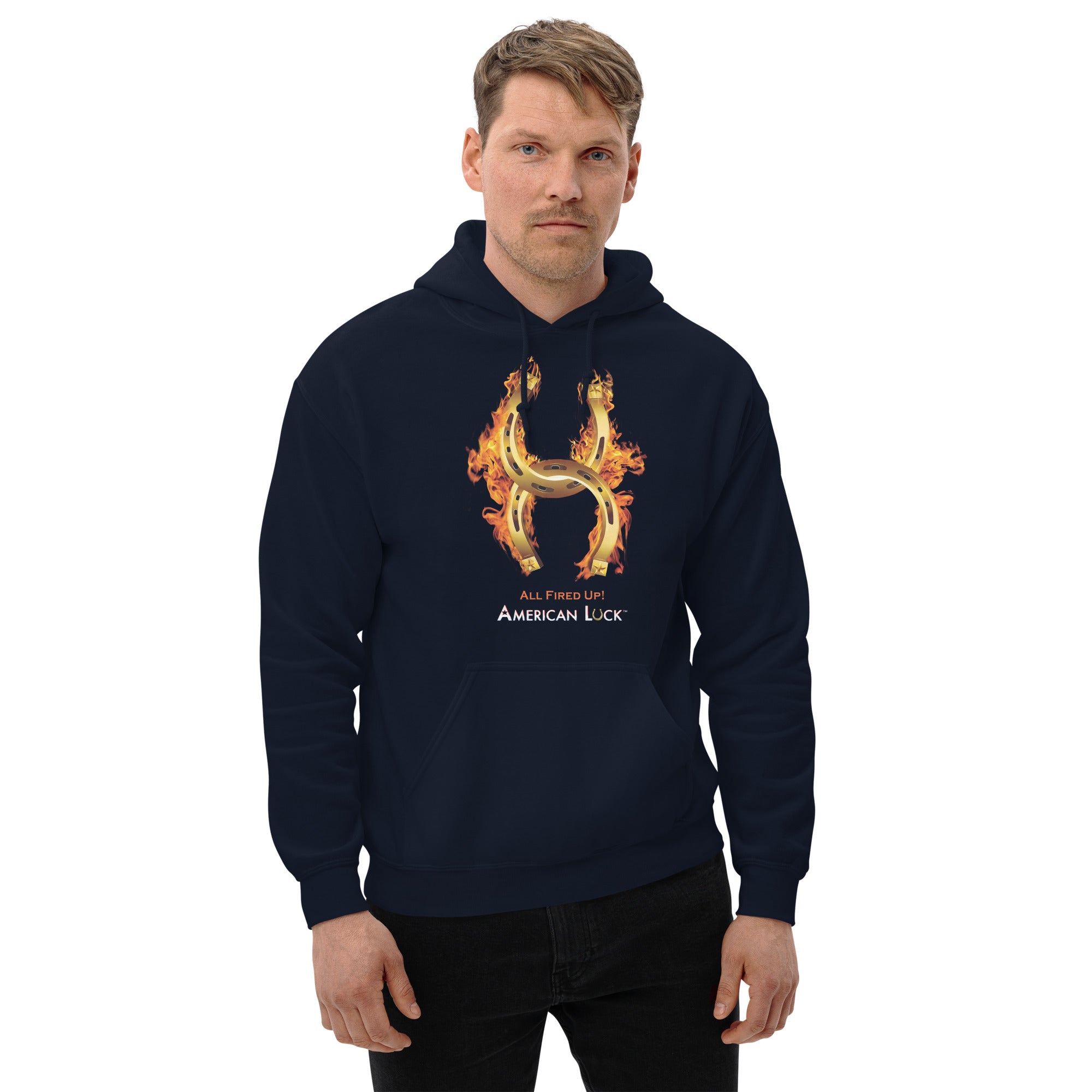 Person wearing a  navy blue hoodie with a fiery golden horseshoe  design, All Fired Up! American Luck.