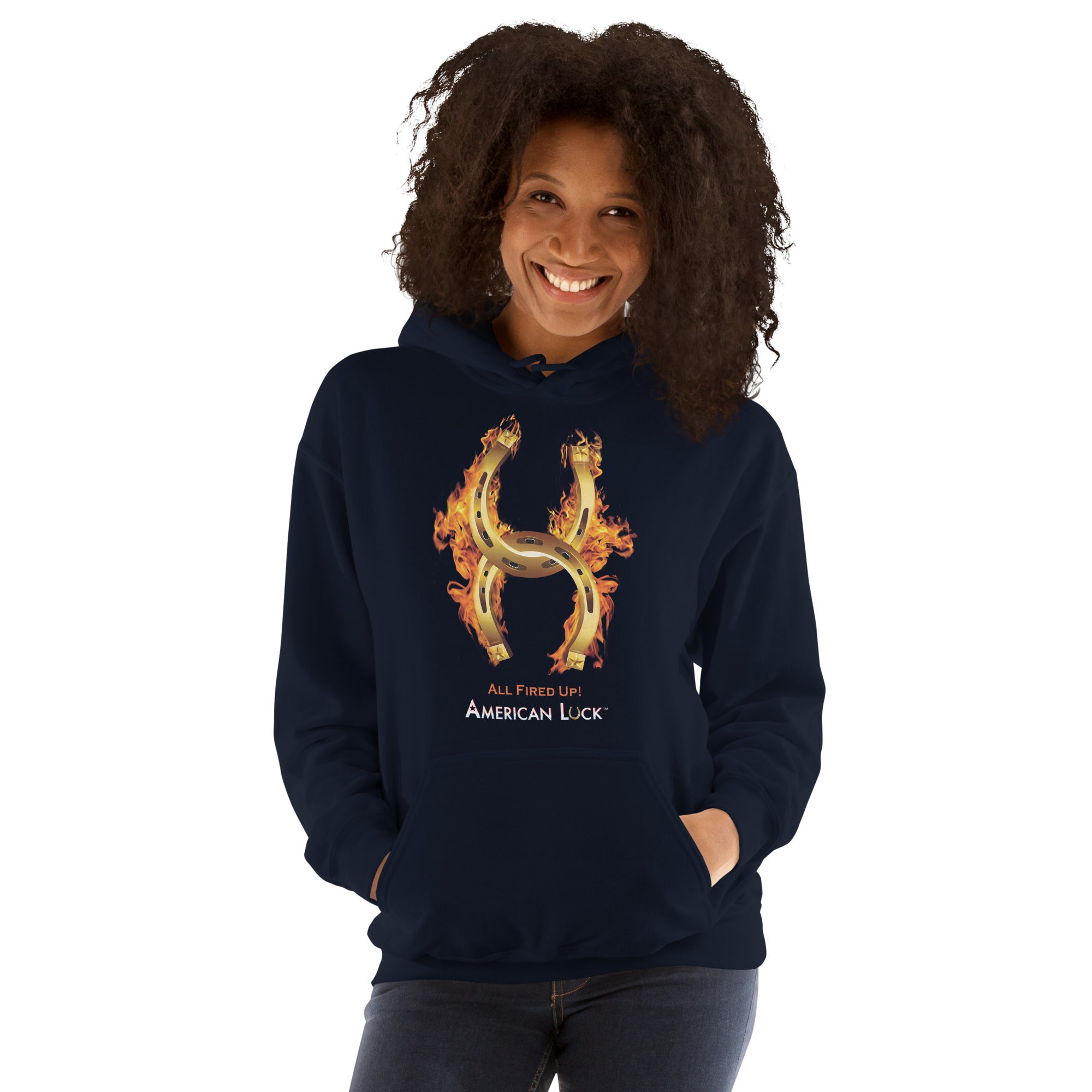 Person wearing a  navy blue hoodie with a fiery golden horseshoe  design, All Fired Up! American Luck.