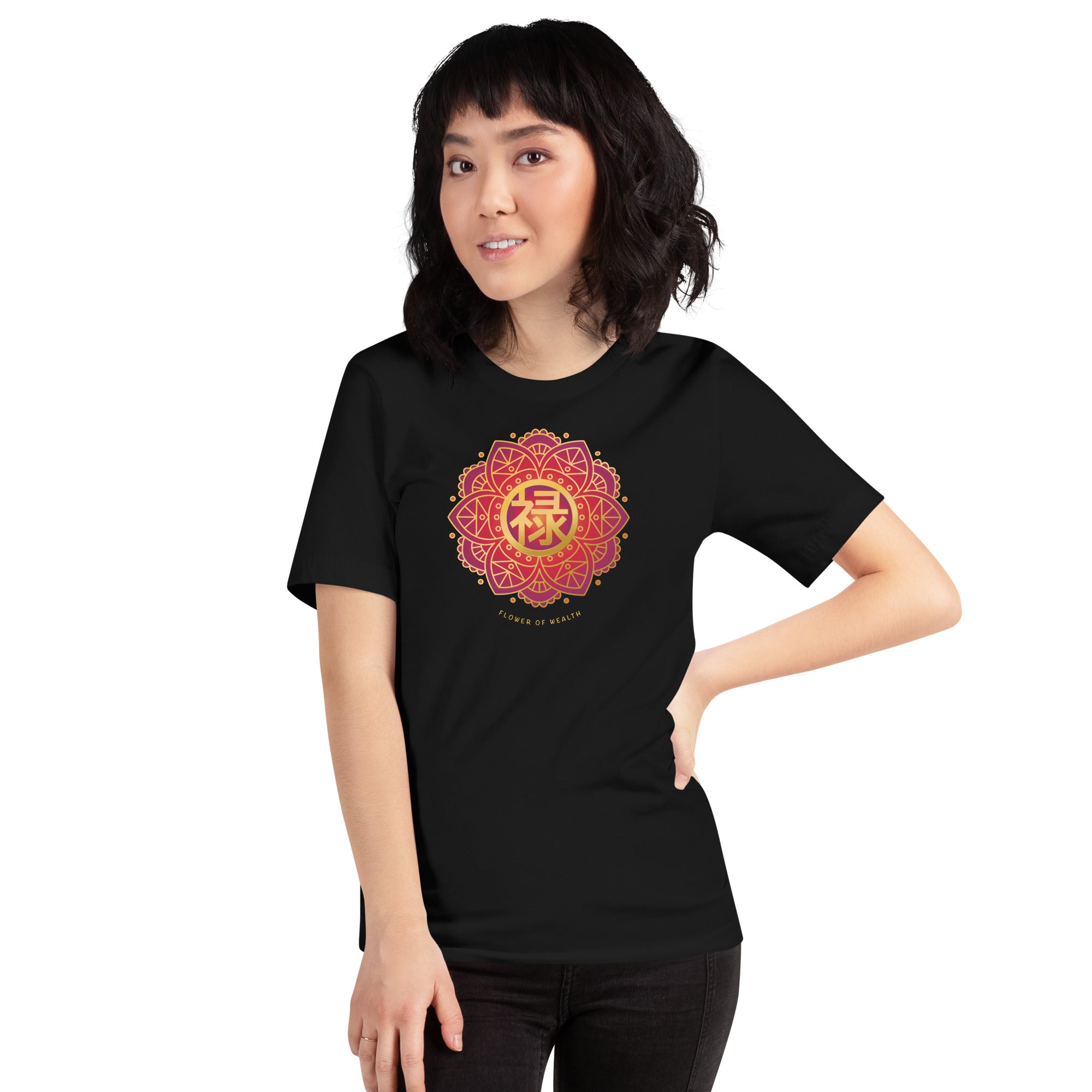 Woman wearing a black t-shirt with a colorful red and gold Chinese prosperity design .