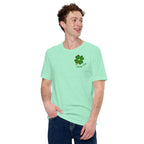 Person wearing a mint green t-shirt with a four-leaf clover design with Lucky Day script.